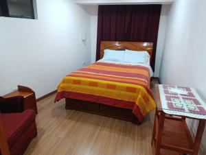 Katil atau katil-katil dalam bilik di Hostal Lucerito