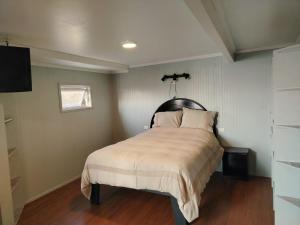 Ένα ή περισσότερα κρεβάτια σε δωμάτιο στο My House Lucy in Valparaiso