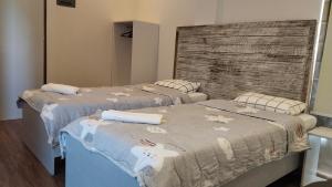 Postel nebo postele na pokoji v ubytování YES Guesthouse