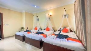 Postel nebo postele na pokoji v ubytování Harmony Indochine d'Angkor + 54 fotografií