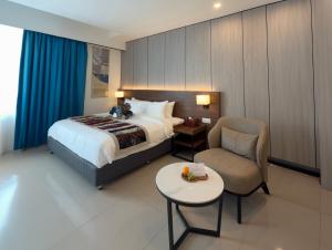 Signata Genting Highlands客房内的一张或多张床位