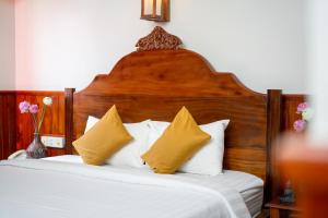 Postel nebo postele na pokoji v ubytování Okay One Hotel