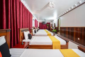 Postel nebo postele na pokoji v ubytování Okay One Hotel
