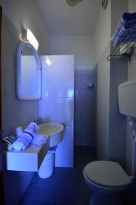 Koupelna v ubytování Hotel Man
