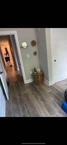 a living room with a hallway with a piano at Full House or Rooms & private bath Stays- Diamond Street Beautiful Luxury Estates in Philadelphia