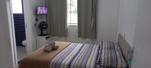 Postel nebo postele na pokoji v ubytování Quarto Privado com Suíte - Oktoberfest 10min