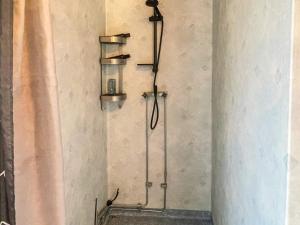 a shower stall in a bathroom with a shower at Countryside retreat for 4 guests in Skånes Fagerhult