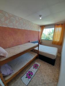 Postel nebo postele na pokoji v ubytování Casa ampla com lazer completo piscina churrasqueira - Arraial do Cabo RJ