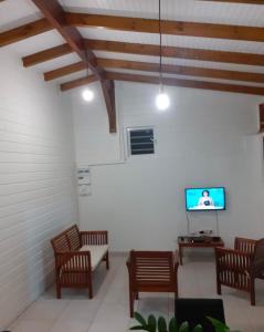 TV a/nebo společenská místnost v ubytování BGF Location + 3 fotografie