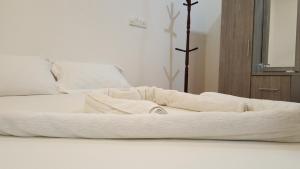 Letto o letti in una camera di Maafushi View