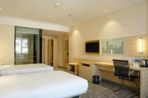 Μια τηλεόραση ή/και κέντρο ψυχαγωγίας στο City Comfort Inn Dongguan Shijie Jiarong Shopping Plaza