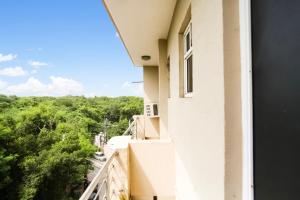 Balkón nebo terasa v ubytování Hotel O Happy Residency