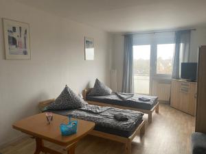 Ruang duduk di Monteur und Ferienwohnung in Magdeburg mit 3 Schlafzimmern 6 Personen BTR 174