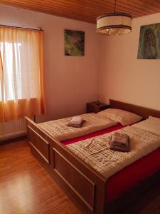 Postel nebo postele na pokoji v ubytování Haus Waldhuber