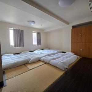 Postel nebo postele na pokoji v ubytování Ace Inn Asakusa