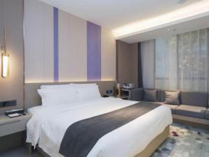 Postel nebo postele na pokoji v ubytování Lavande Hotel Shanghai Jing'an Shibei Gaoxin + 179 fotografií