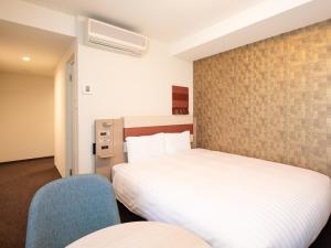 Comfort Hotel ERA Ise客房内的一张或多张床位