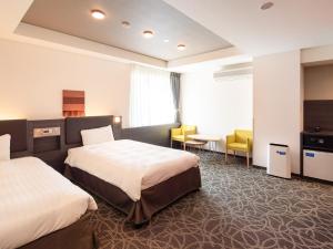 Postel nebo postele na pokoji v ubytování Comfort Hotel ERA Ise
