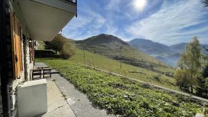 a house with a view of a mountain at Tramonto sulla Pista a Prato Nevoso in Prato Nevoso