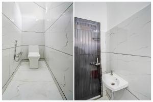 Koupelna v ubytování Super Hotel O Burari New Delhi + 24 fotografií