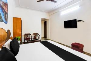 Televisor o centre d'entreteniment de Super Hotel O Paharganj Near Railway Station Formerly Chand Palace