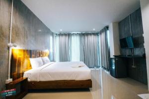 Postel nebo postele na pokoji v ubytování Seven Days a Week Resort + 16 fotografií