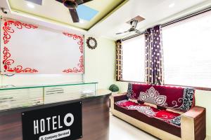 Super Hotel O Guntur的休息区