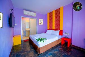 En eller flere senge i et værelse på PS Resort + 168 billeder