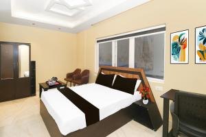 Super Collection O Ranchi Station Near Rajendra Chowk Formerly Bodhraj Paradise客房内的一张或多张床位