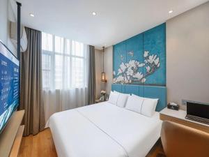 Μια τηλεόραση ή/και κέντρο ψυχαγωγίας στο Jinjiang Inn Xuzhou Pizhou Sanchahe Road