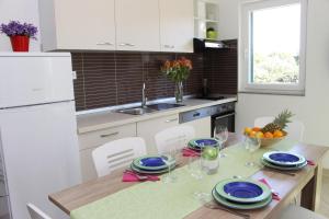 Kuchyň nebo kuchyňský kout v ubytování Smart Apartments