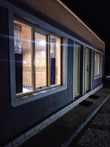 a row of windows on the side of a building at RI-YOUL HOUSE Pangong in Lukung