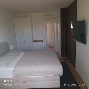 Postel nebo postele na pokoji v ubytování Marko Rooms