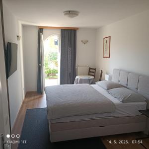 Postel nebo postele na pokoji v ubytování Marko Rooms