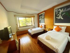 Katil atau katil-katil dalam bilik di Chiang Khan Boutique Hotel