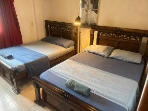 Voodi või voodid majutusasutuse Lodging Gosen toas