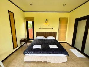 Postel nebo postele na pokoji v ubytování Water Jade Natural Resort + 43 fotografií