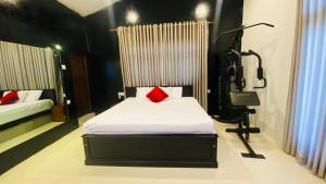 Postel nebo postele na pokoji v ubytování Hawana Home Stay