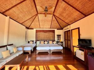 TV a/nebo společenská místnost v ubytování Pai Hotsprings Spa Resort