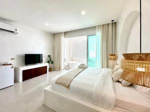 Ένα ή περισσότερα κρεβάτια σε δωμάτιο στο Evelia Kohsamed