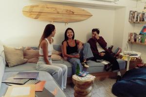 a group of people sitting on a couch at Little Drifter Bondi in Sydney