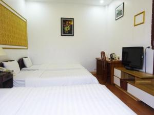 TV a/nebo společenská místnost v ubytování Hanoi Discovery II Hotel