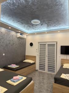 TV a/nebo společenská místnost v ubytování Apartmani Filip