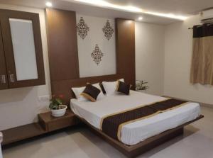Voodi või voodid majutusasutuse Mysore Happy Vibes 3bhk flat toas