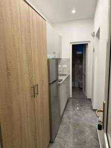 Kuchyň nebo kuchyňský kout v ubytování Apartmani Filip