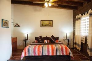 Ένα ή περισσότερα κρεβάτια σε δωμάτιο στο Paradise Hotel Boutique & Lounge
