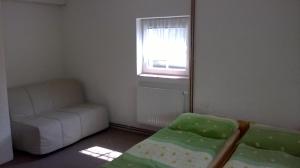 Posteľ alebo postele v izbe v ubytovaní Guest House Honzik