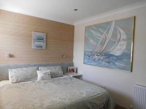 Postel nebo postele na pokoji v ubytování Maple Cottage B&B