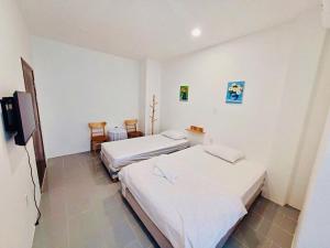 Ένα ή περισσότερα κρεβάτια σε δωμάτιο στο Yen Minh Resthouse +47 φωτογραφίες