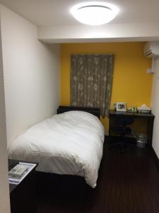 Postel nebo postele na pokoji v ubytování Ace Inn Asakusa